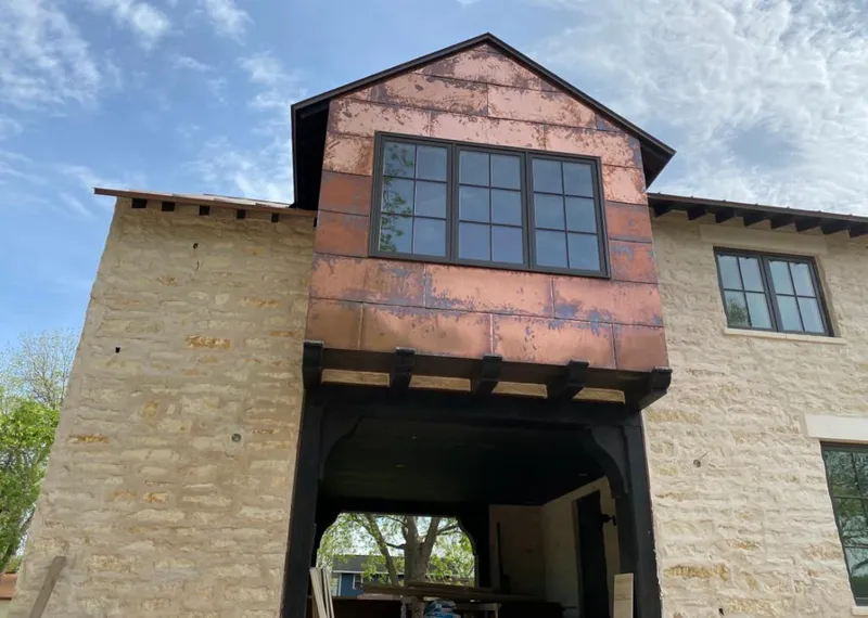 Copper metal panel facade on a stone building for Metal Roof Coating in Annville